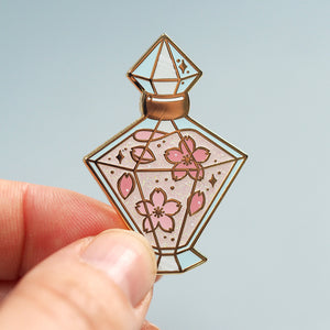 
            
                Load image into Gallery viewer, Sakura Springtime Potion - Glitter Metal Enameled Pin
            
        