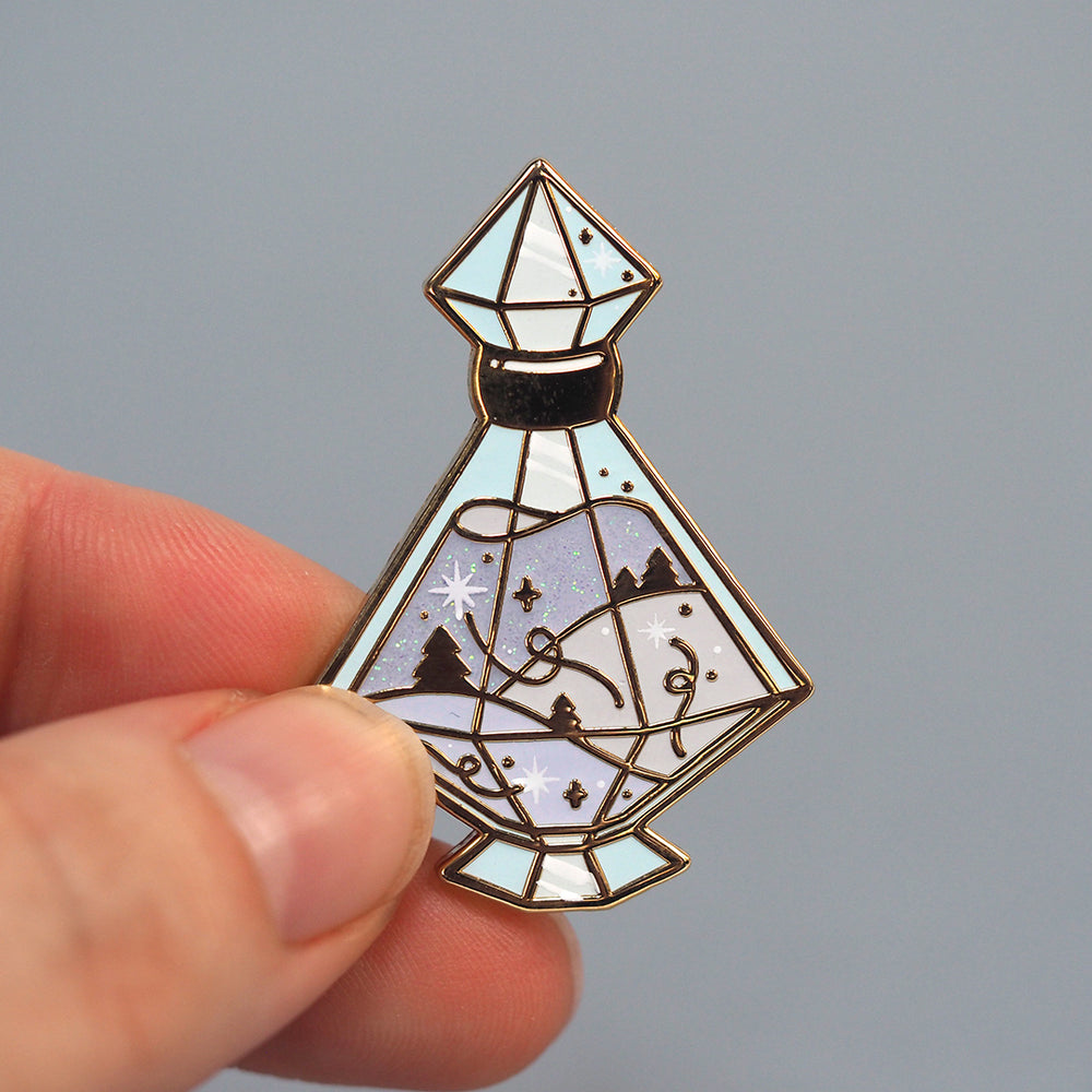 
            
                Load image into Gallery viewer, Bottled Winter Potion - Glitter Metal Enameled Pin
            
        