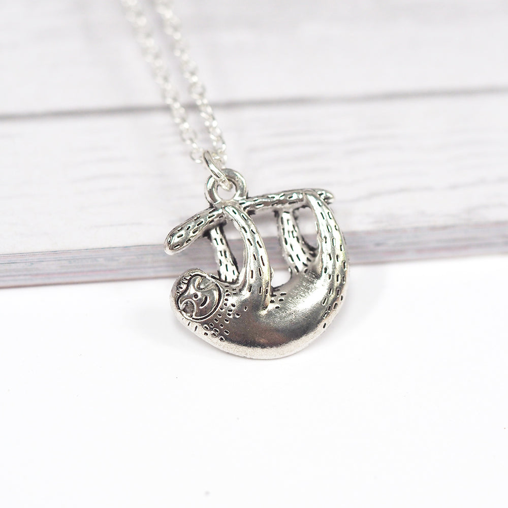
            
                Load image into Gallery viewer, Happy Sloth Necklace
            
        