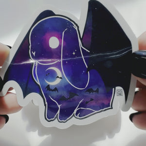
            
                Load and play video in Gallery viewer, Rainbow Holographic Vinyl Sticker - Bat Moon Bunny
            
        
