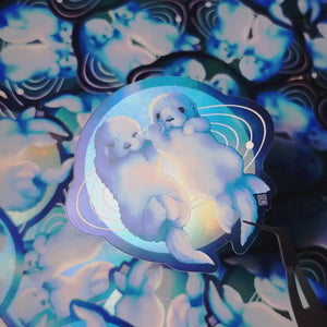 
            
                Load and play video in Gallery viewer, Holographic Vinyl Sticker - Cosmic Otters Holding Hands
            
        