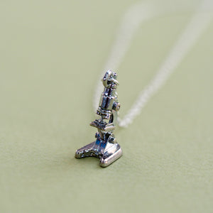 
            
                Load image into Gallery viewer, Tiny Silver Microscope Necklace
            
        