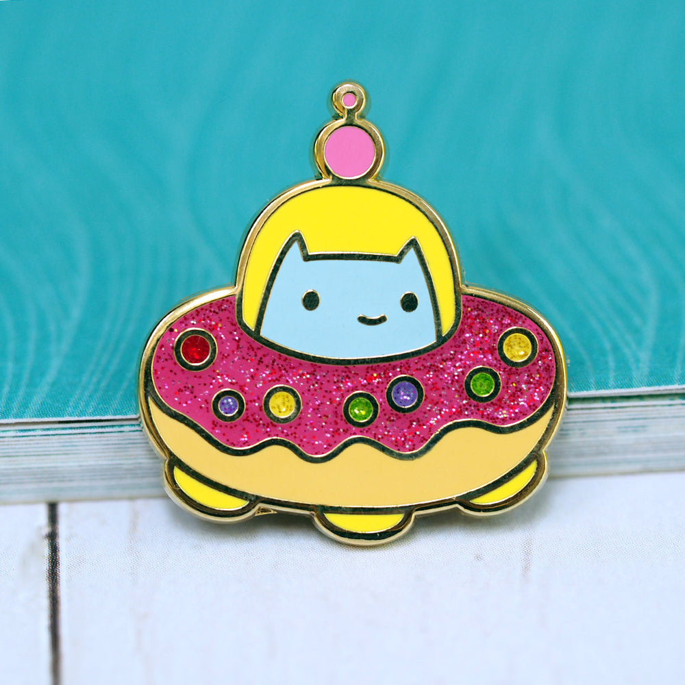 
            
                Load image into Gallery viewer, Commander Kitty! Glitter Donut Spaceship - Metal Enameled Pin
            
        