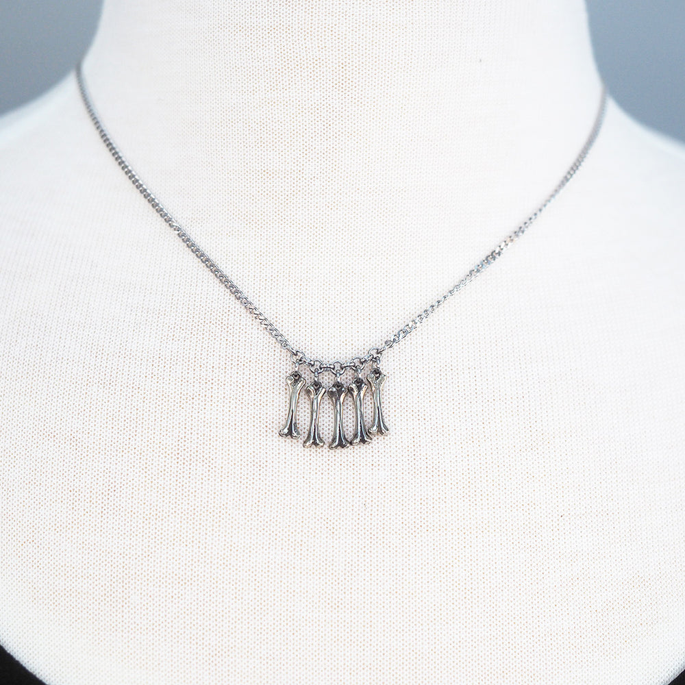 
            
                Load image into Gallery viewer, Mini Bone Necklace
            
        