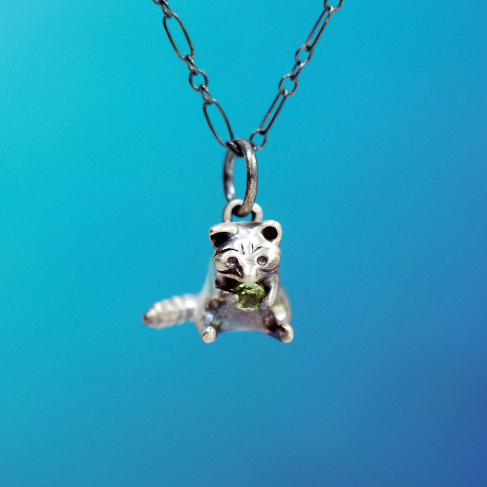 
            
                Load image into Gallery viewer, Greedy Raccoon Gemstone Necklace - Sterling Silver with Peridot
            
        