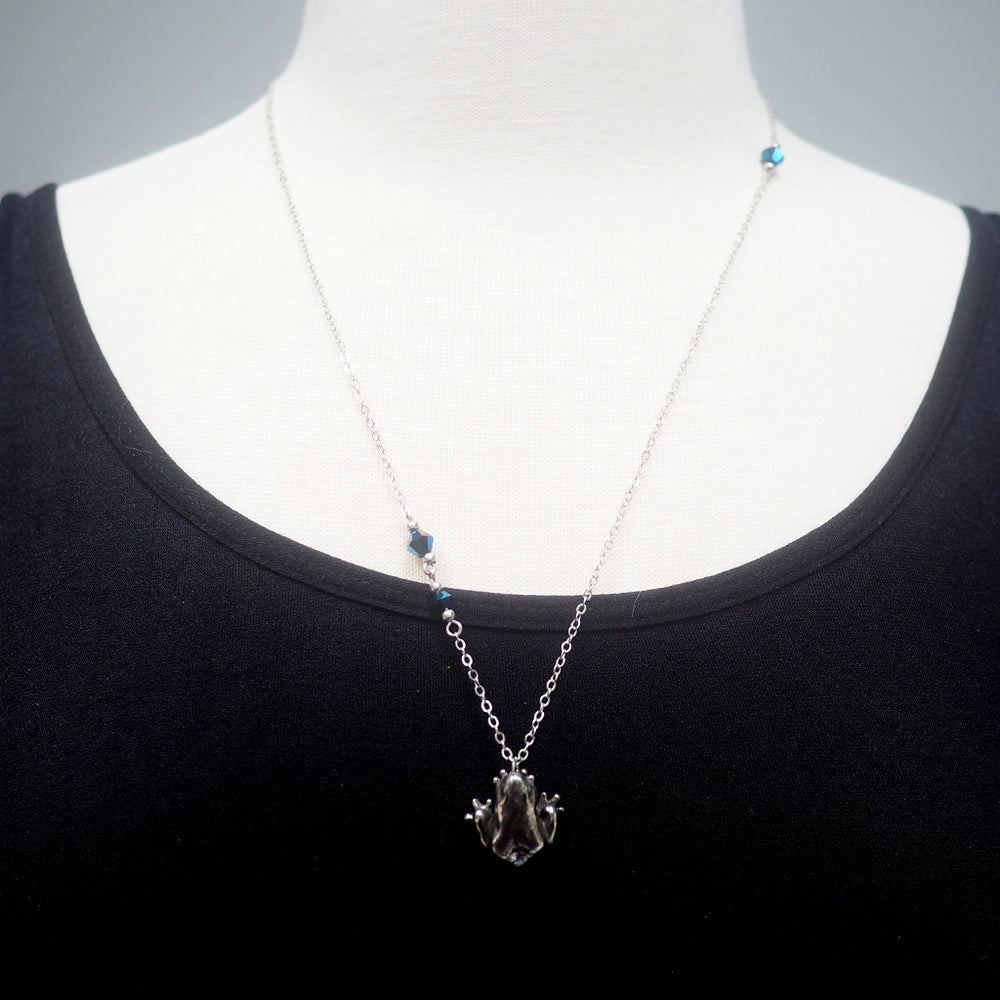 
            
                Load image into Gallery viewer, Silver Dart Frog Necklace
            
        