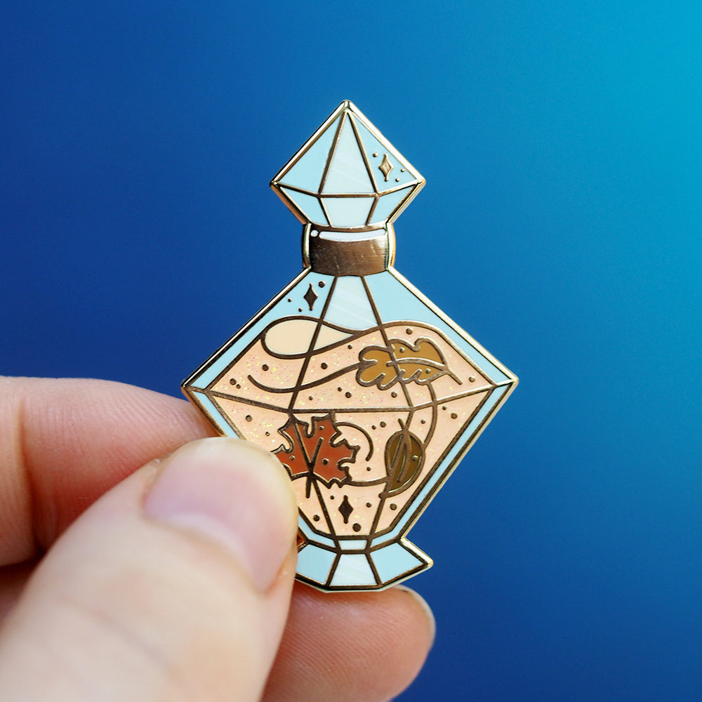 
            
                Load image into Gallery viewer, Bottled Autumn Potion - Glitter Metal Enameled Pin
            
        