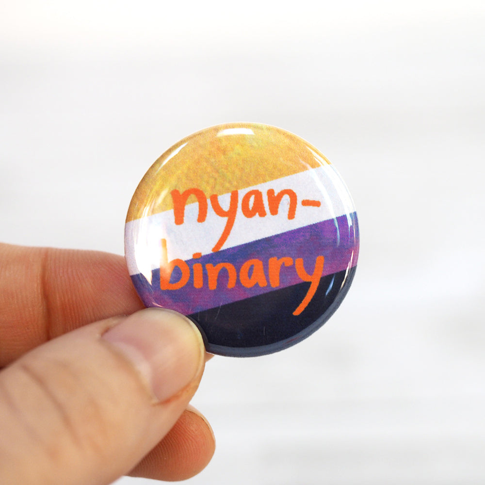 
            
                Load image into Gallery viewer, Nyan Binary Enby Pride Pin
            
        