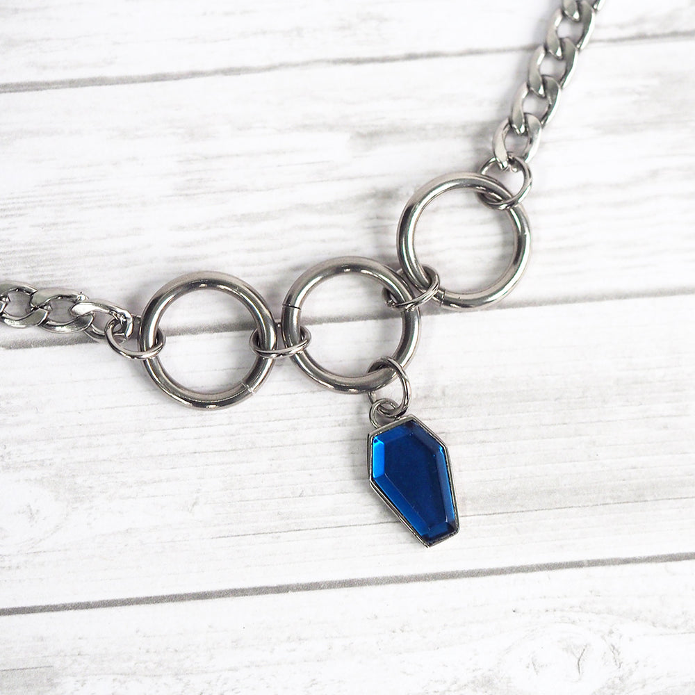 
            
                Load image into Gallery viewer, Lunar Blue Coffin Choker
            
        